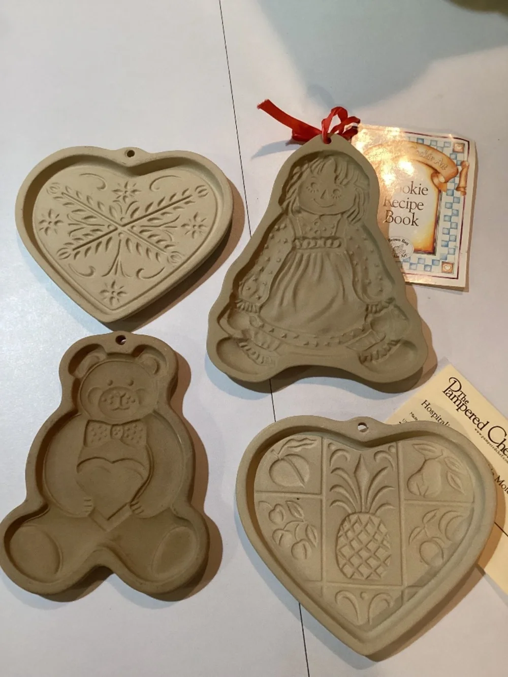 Set of 4 ceramic cookie molds, 3 Pampered Chef, 1 Brown Bag Cookie Art